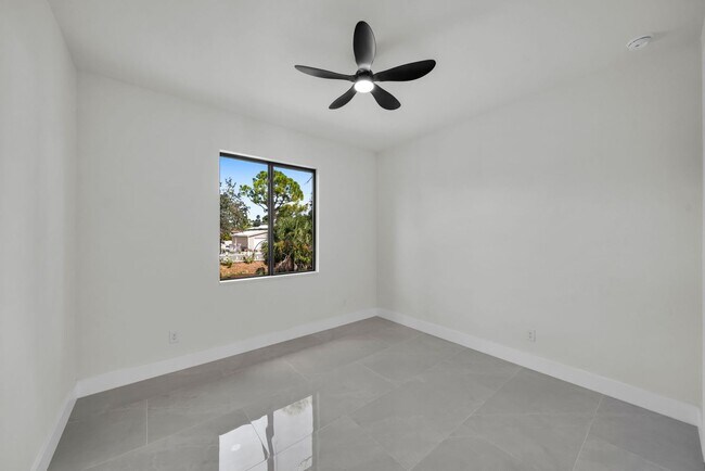 Building Photo - Single family for rent in Port Charlotte. New construction. 3+Den/ 2 bath. City water.