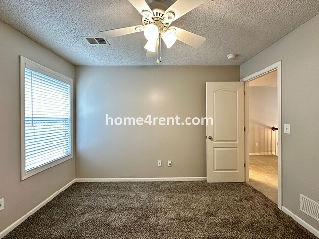 Building Photo - Beautiful Four-Bedroom Home with Three Car...