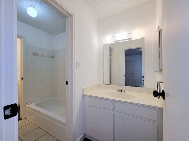 Building Photo - Beautiful two-story corner unit filled with natural light!