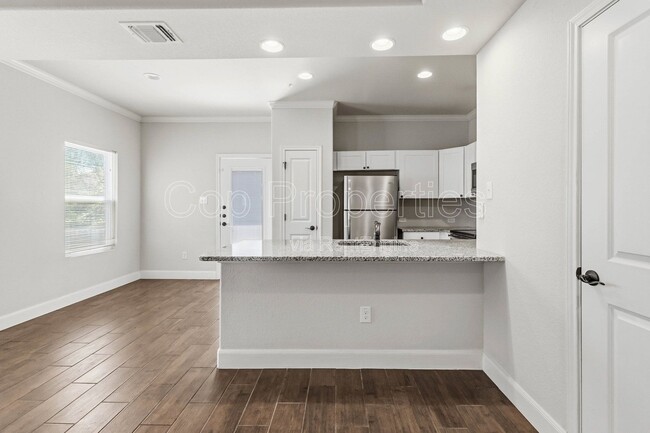 Building Photo - 6314 Melanzane Ave