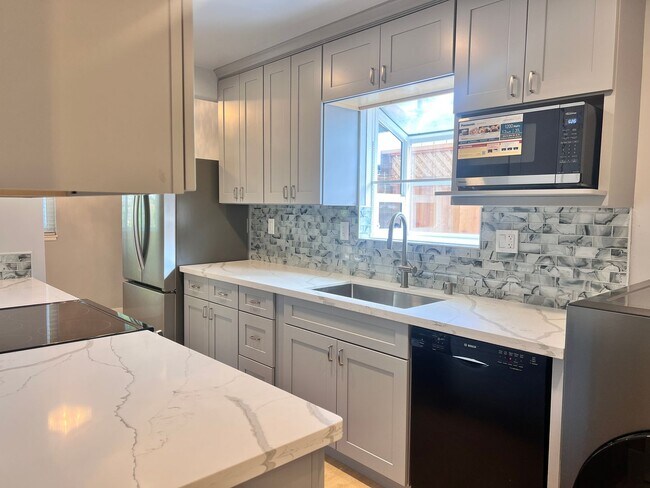 Primary Photo - Completely Remodeled 4 Bedroom Home with C...