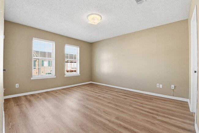 Building Photo - Come see this charming 2-story condo featuring 2 bedrooms and 2.5 bathrooms!