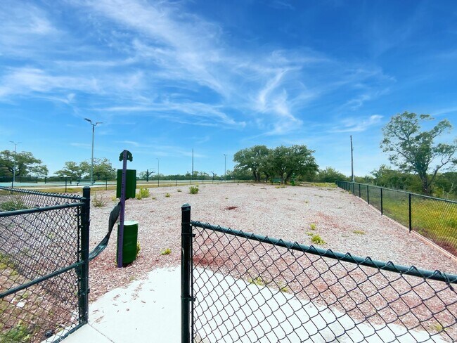 Building Photo - Stylish, Spacious & Close to It All – Your Ideal Townhome Awaits!
