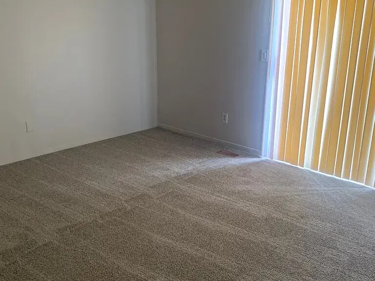 Bedroom1 with balcony - 7526 Banner Ct