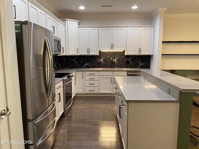 Building Photo - Live in Style, Relax in Comfort, and Love ...