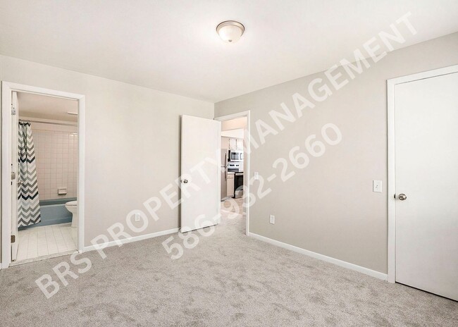 Building Photo - Charming 2-Bedroom Condo in Clinton Twp. –...