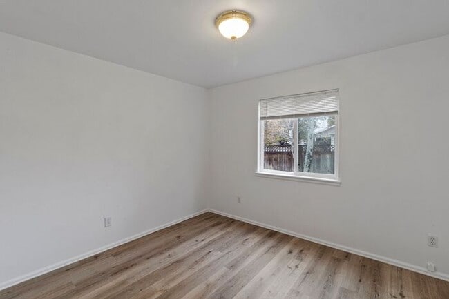 Building Photo - Wonderful 3 Bedroom Home with New Flooring and Paint