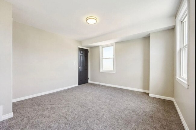 Building Photo - Fully Renovated Two-Bedroom Townhome In Du...