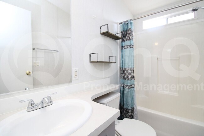 Building Photo - 9721 E Empress Ave