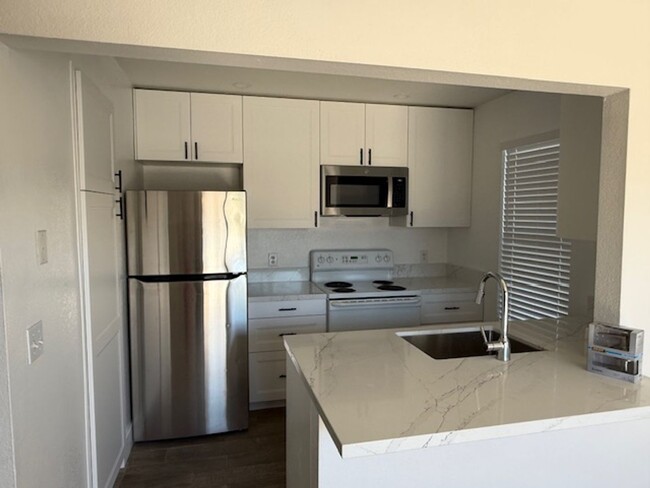 Primary Photo - Condo in Gated Palm Lake