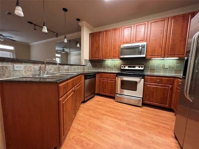 Building Photo - Beautiful 1st Floor Corner Condo – Modern ...