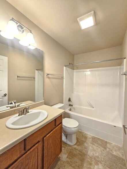 Building Photo - 5205 -5207  E. Upriver Dr.