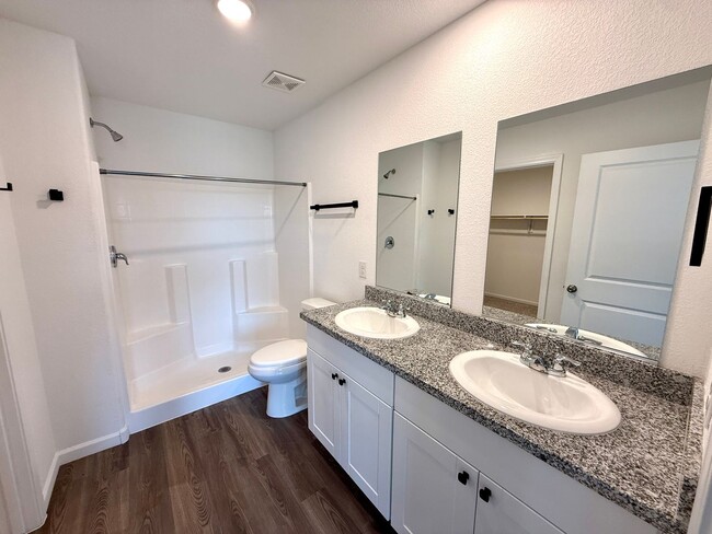 Building Photo - Spacious 4 Bedroom Home with Solar & Modern Upgrades- Available Now!