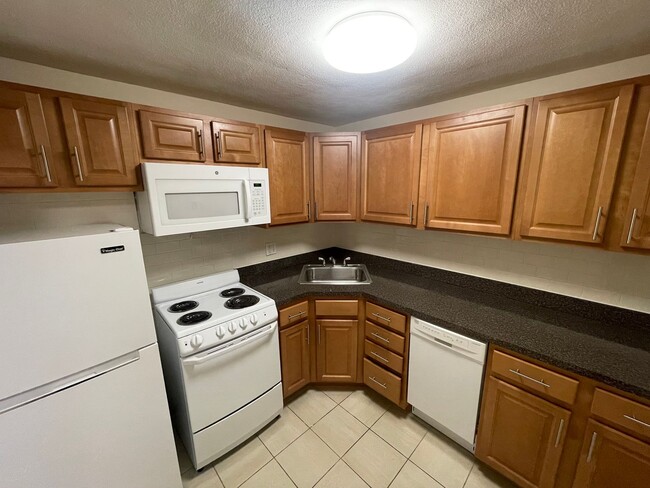 Building Photo - Divided Studio with Balcony over Watertown Square