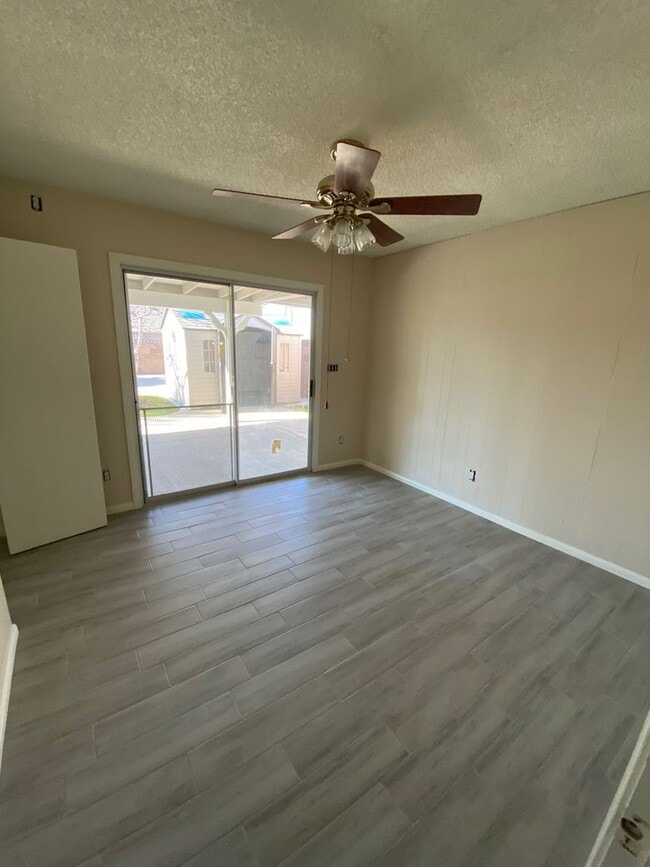 Building Photo - Single Story 4 bed, 2 bath home with RV Access