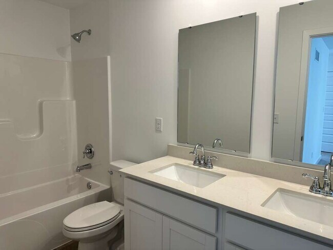 Building Photo - Beautiful new construction featuring 4 bedrooms and 2.5 baths, ideally located just minutes from ...