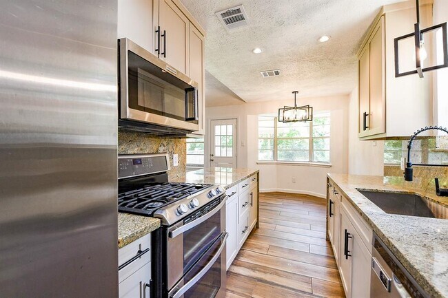 Building Photo - 25003 Spring Creek Dr