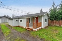 Building Photo - TWO BEDROOM WITH DEN/OFFICE IN THE HIGHLANDS