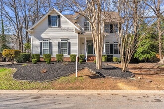 Building Photo - Beautifully Appointed 4BR Home Featuring a Screened Porch, Spacious Living Areas & Community Pool...