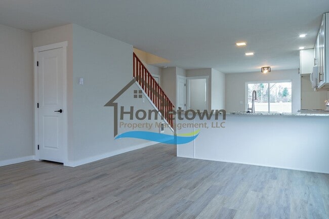 Building Photo - 3 Bedroom Home with 1.5 Bathrooms and an A...