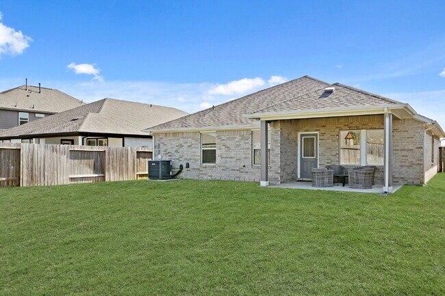 Building Photo - "Charming 4-Bed Sanctuary on Gentle Breeze Lane - Spacious 1861 Sq. Ft. Home with 2 Full Baths in...