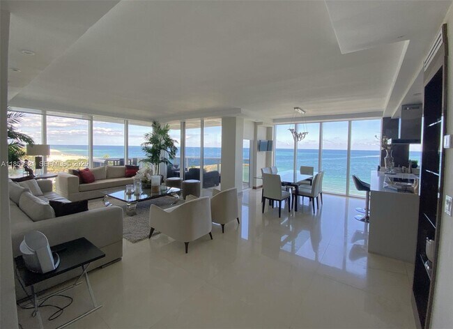 Building Photo - 10275 Collins Ave