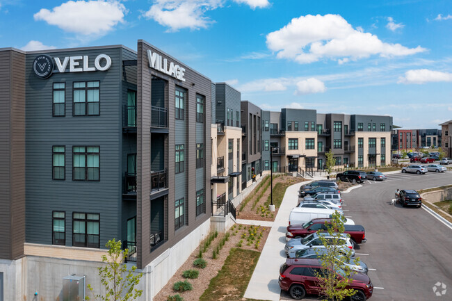 Building Exterior & Parking | Velo Village | Apartment in Franklin WI - Velo Village