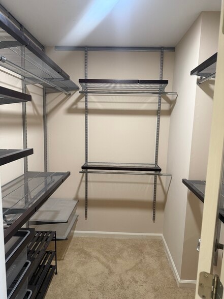 1 of 2 Custom Primary Closets - 2745 Lenox Rd NE