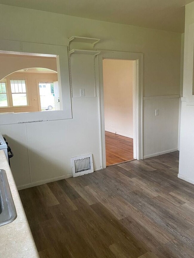 Building Photo - Spacious 3-Bedroom Home with Hardwood Floo...
