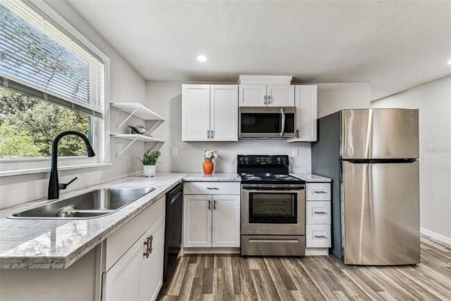 Building Photo - 1006 E 26th Ave