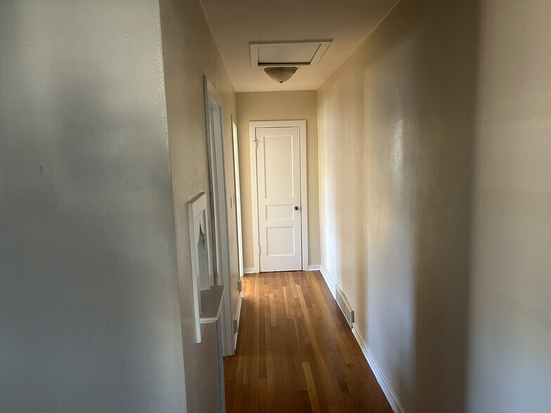 Hallway with closet at end - 208 Circular Rd