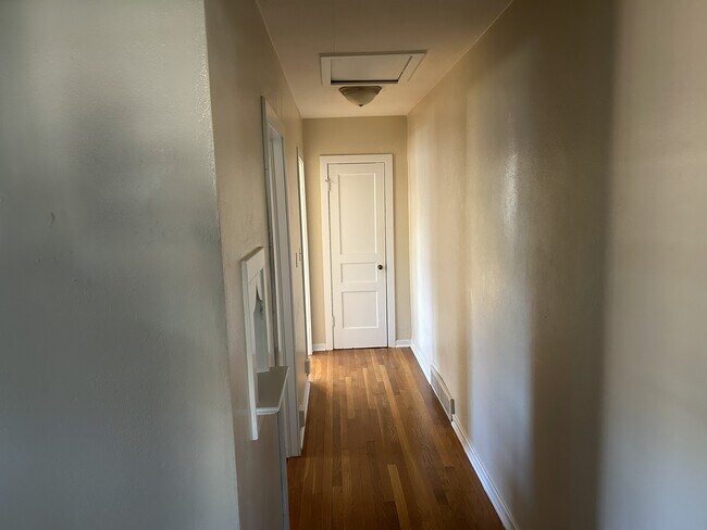 Hallway with closet at end - 208 Circular Rd