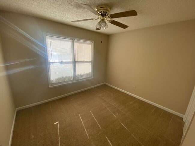 Building Photo - NOW AVAILABLE! Charming 2-Bedroom, 2-Bathroom Single-Level Townhome