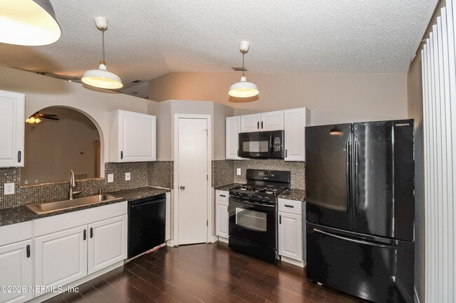 Building Photo - 7336 Lawn Tennis Ln