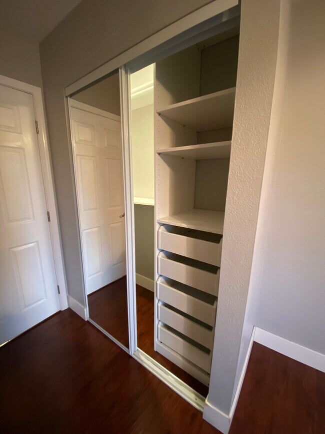 Bedroom 1 closet with built ins - 8561 Cedar Dr