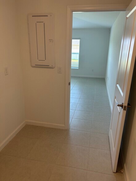 Looking out of Laundry Room to Main Room - 4213 Longmour Ln