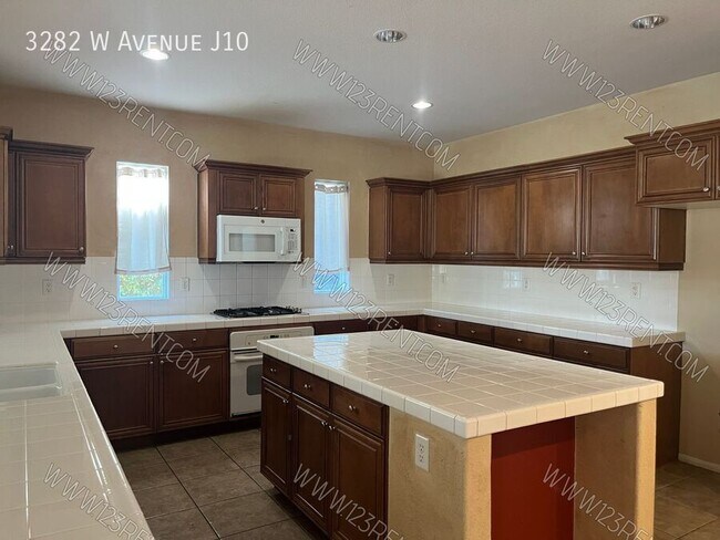 Building Photo - 3282 W Ave J 10