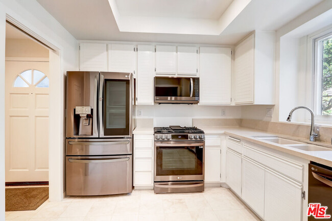 Building Photo - 8505 Gulana Ave