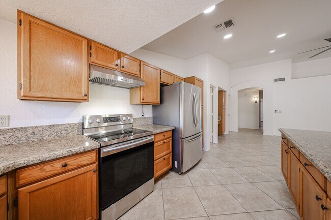 Building Photo - Welcome to this stunning 4-bedroom, 2-bath...