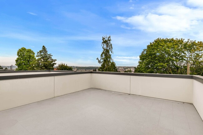 Building Photo - 3 Bedroom Modern Industrial Townhome with City Views & Rooftop Oasis