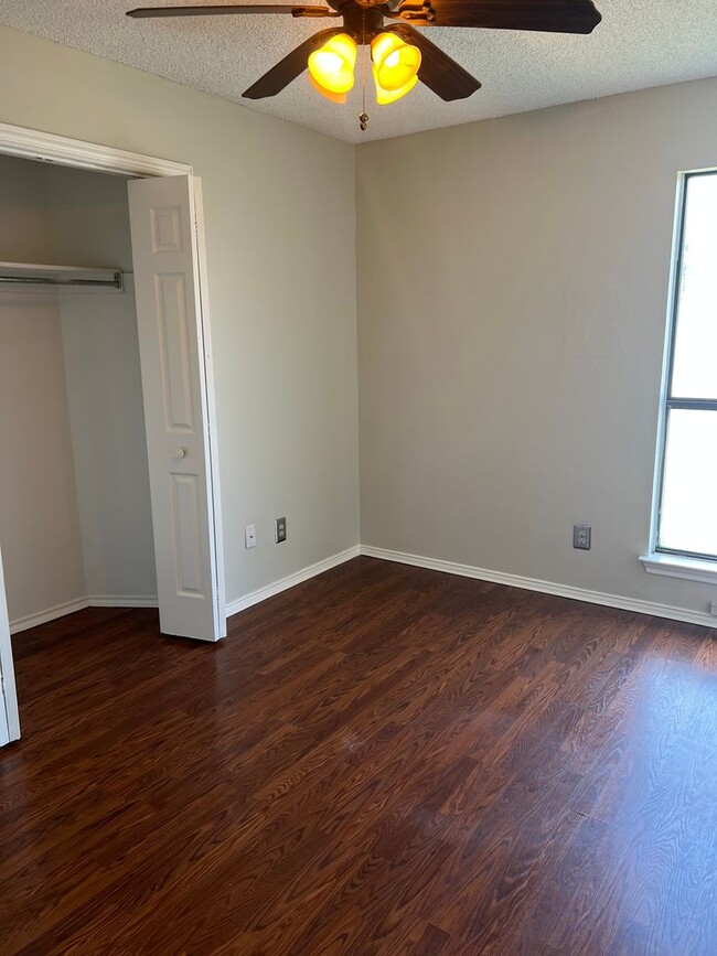 Building Photo - Corner Lot with Large Deck and Cozy Backyard