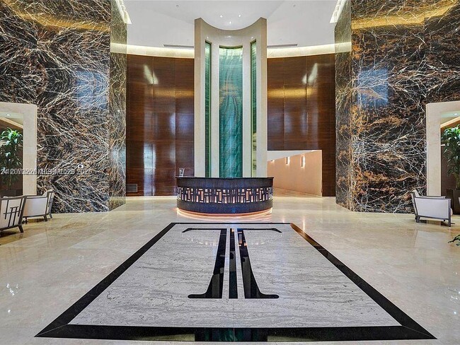 Building Photo - 15811 Collins Ave