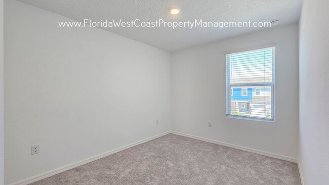 Building Photo - OUTSTANDING BRAND NEW TOWNHOME! SKYE RANCH...