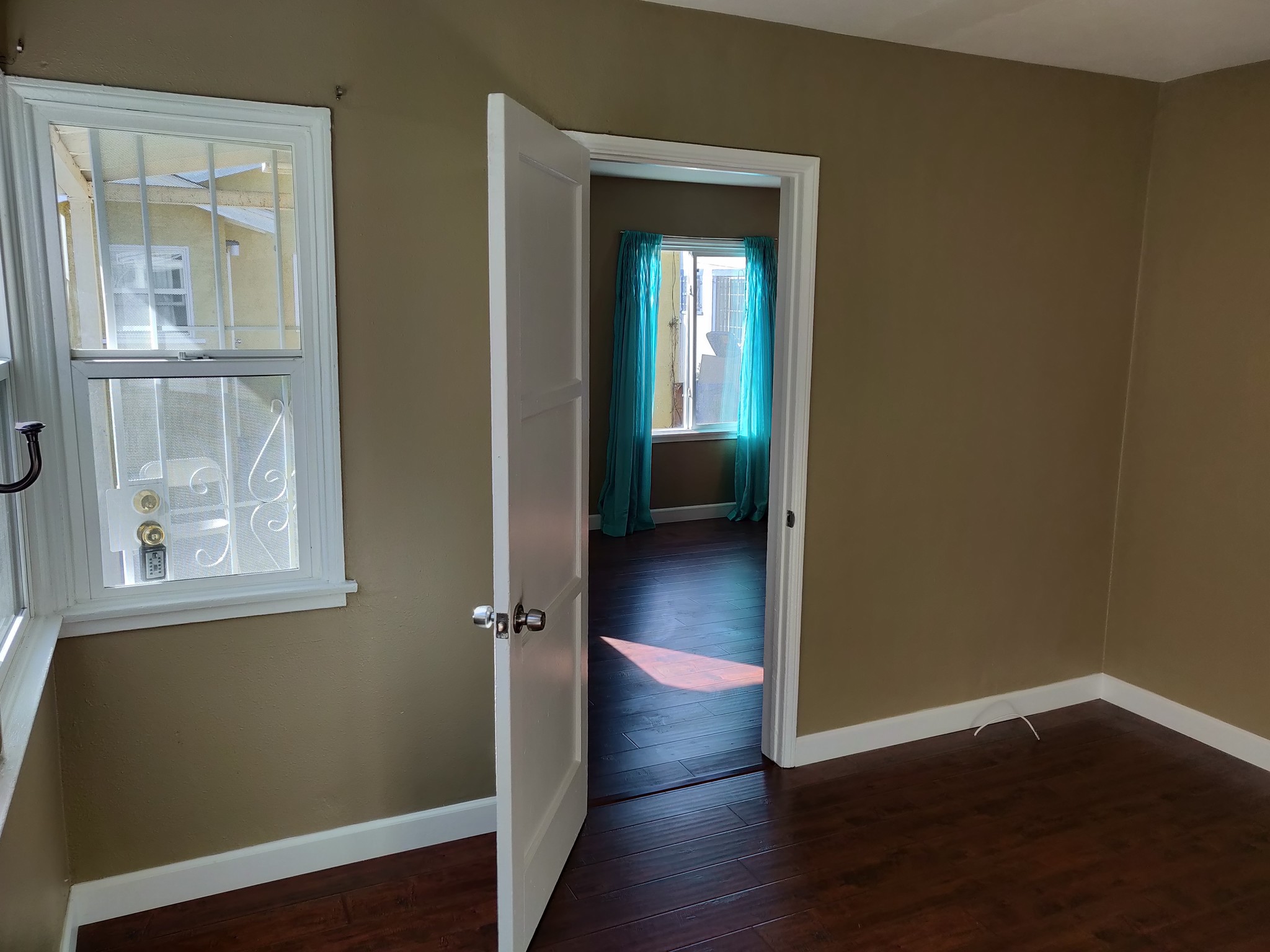 Bedroom leading to living room - 6414 10th Ave