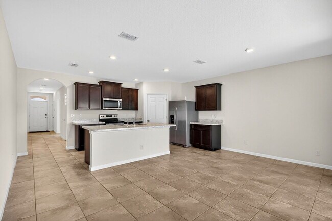 Building Photo - Renovated 4 Beds 2 Baths Single Family on Over a QTR Acre lot | Huge Yard