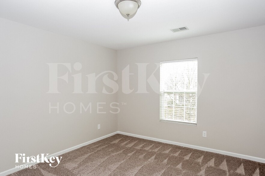 Building Photo - 6906 Barefoot Forest Dr