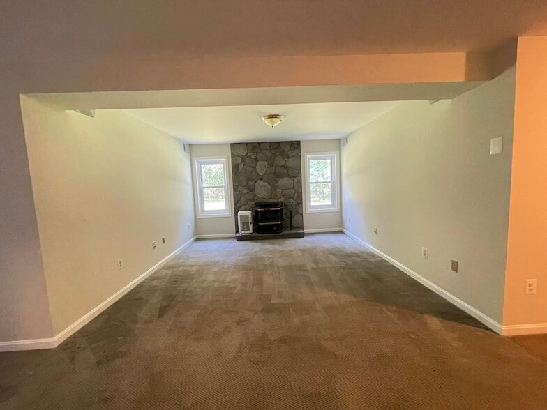 living room with fireplace - 249 Amberleigh Dr