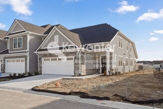 Building Photo - Located in Westfield, IN, this attractive 3-bedroom, 2.5-bath home sits on a corner lot within an...