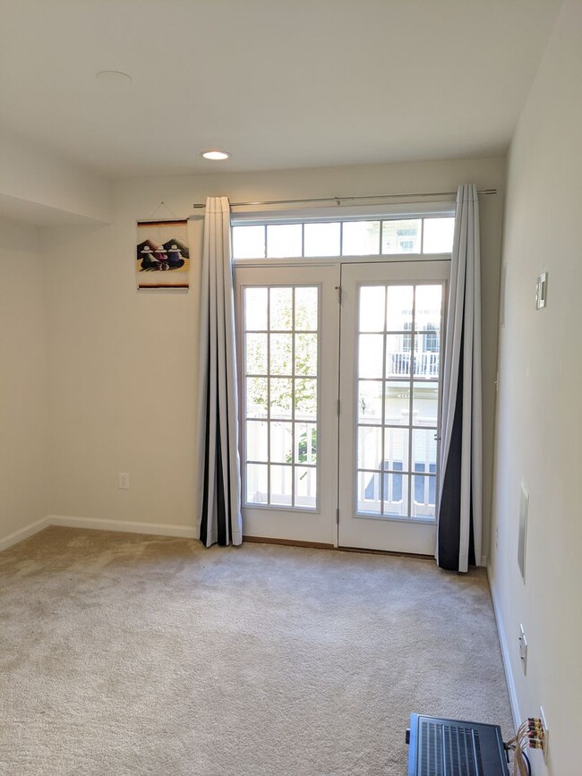 Building Photo - Bottom level (two story) *END UNIT* condo ...