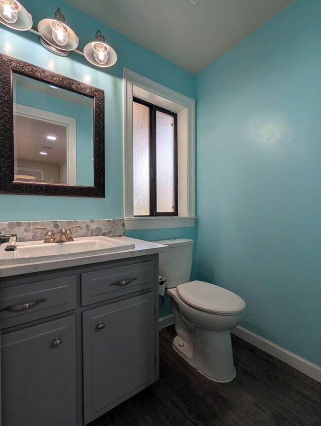 Building Photo - Updated 3-Bedroom, 2.5-Bath Home ~ Solid Surface Flooring and Spacious Kitchen!